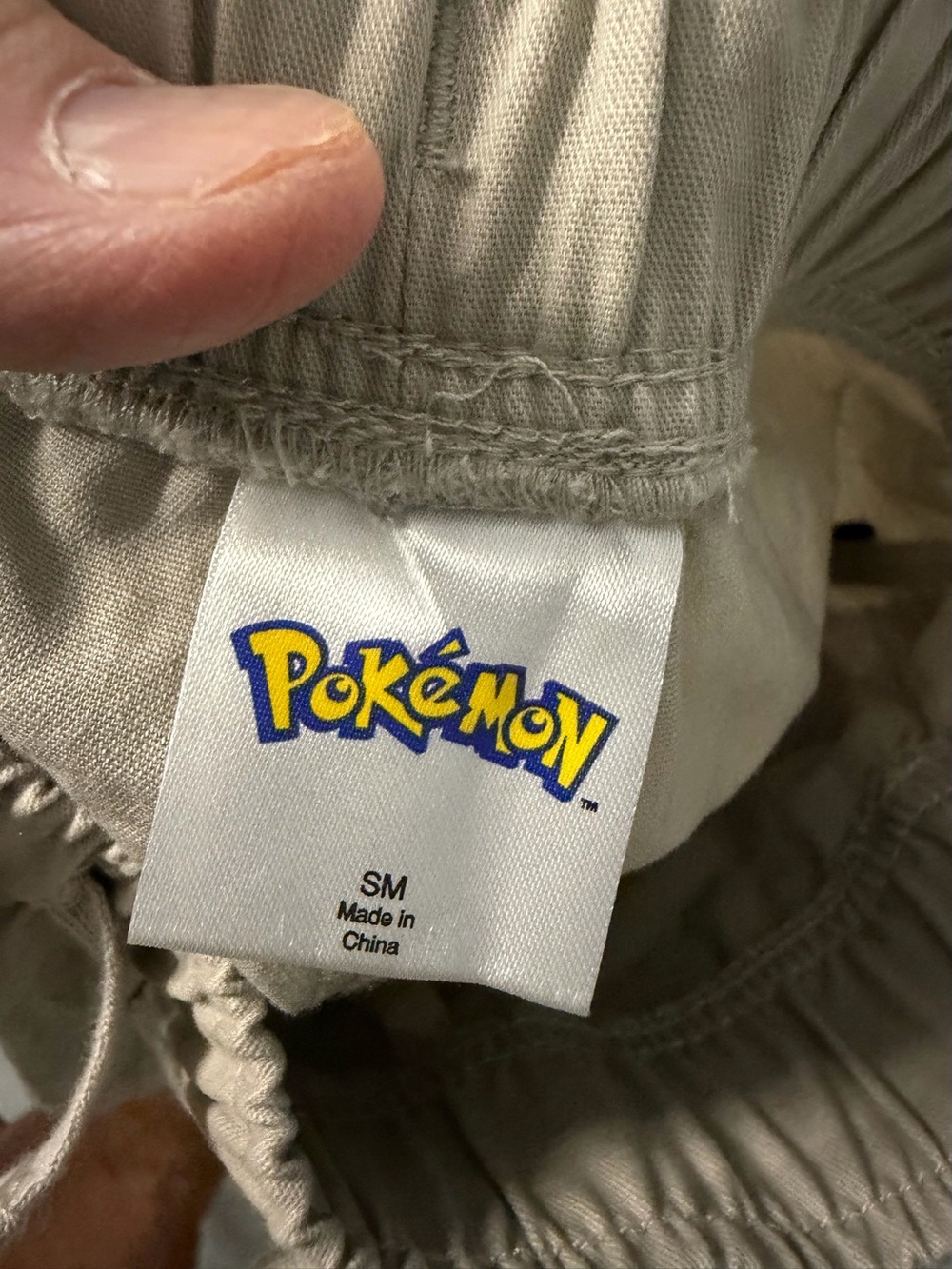 Pokémon Logo Khaki Drawstring Shorts - Tan size small nwt